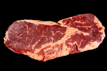 Rib-eye steak isolated on black