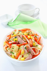 Salad with ham, paprika, corn and cheese