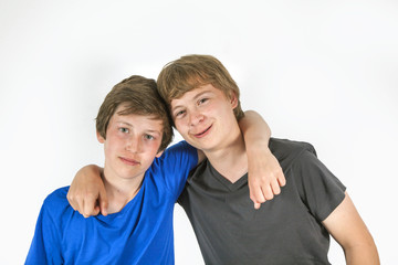 Fototapeta premium two friends hugging and posing