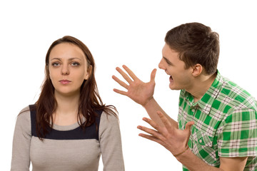 Young man gesturing at his girlfriend