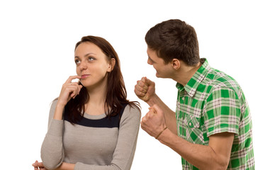 Young man balling his fists in frustration