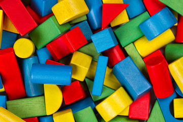 Toys blocks, multicolor wooden building bricks, colorful heap