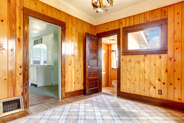 Empty plank wall bedroom