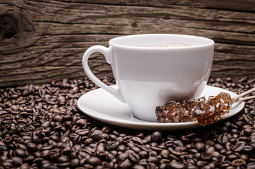 Cup of coffee  and coffee beans