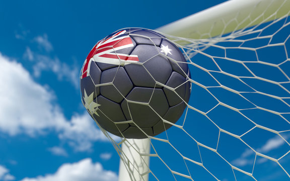 Australia flag and soccer ball in goal net