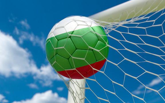 Bulgaria flag and soccer ball in goal net