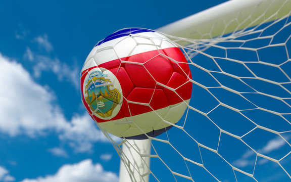 Costa Rica flag and soccer ball in goal net