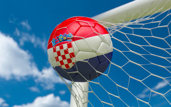 Croatia flag and soccer ball in goal net