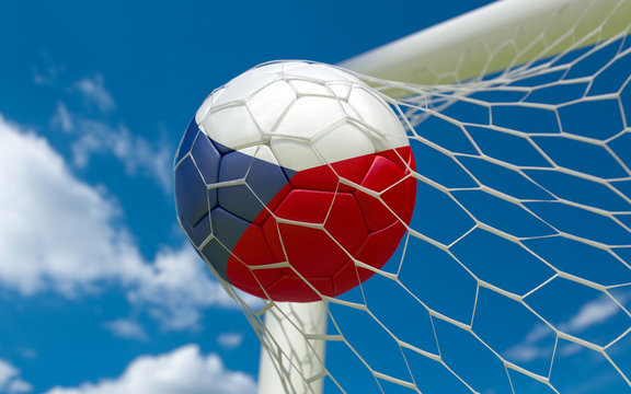 Czech Republic flag and soccer ball in goal net