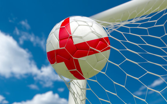 England flag and soccer ball in goal net