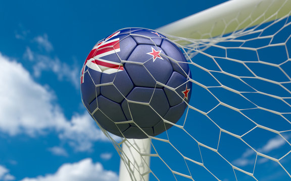 New Zealand flag and soccer ball in goal net