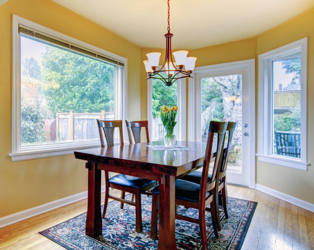 Cozy small dining room with walkout deck