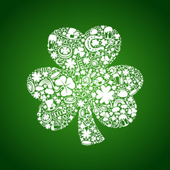 St Patrick's Days card of white objects on green background