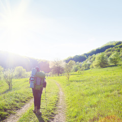 Woman traveller on country road