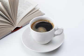 cup of black coffee with foam