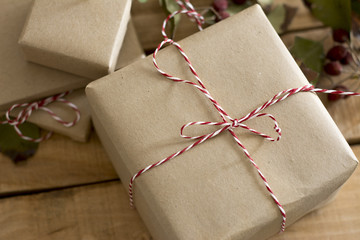 gift box wrapped in recycled paper with ribbon bow