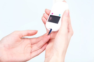 Measuring glucose level blood close-up