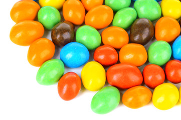 Different colorful fruit candy isolated on white