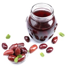 Black olives in glass jar, isolated on white