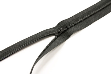 Obraz premium Black zip fastener close up isolated on white background,Concept