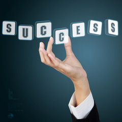 Businessman hand and word success. Concept of business success.