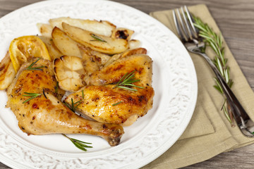 Roasted Chicken with Rosemary with potato. Selective focus.