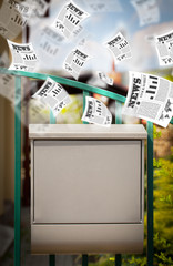 Post box with daily newspapers flying