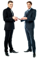 Two businessmen preparing a deal