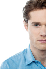 Fototapeta premium Half face portrait of a smart guy