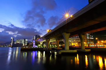 Viaduct in city at night