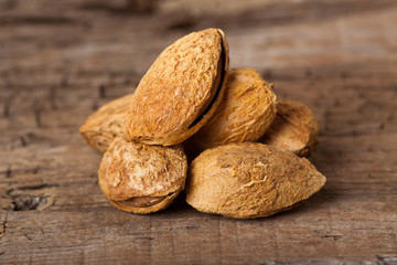 Almonds on wooden board