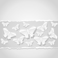 Origami  background. Paper is transformed to butterflies.