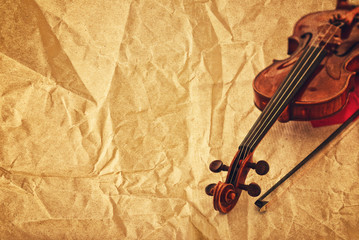 Classic violin on grunge paper background