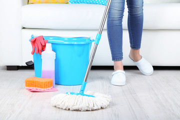 Cleaning floor in room close-up