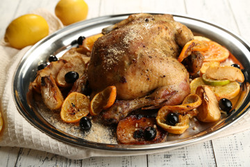Whole roasted chicken with vegetables