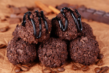 Delicious chocolates on table close-up