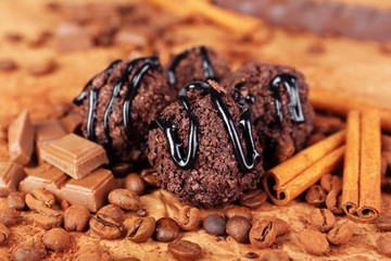 Delicious chocolates on table close-up
