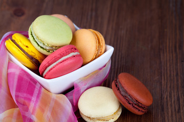 Macaroons on a wooden table