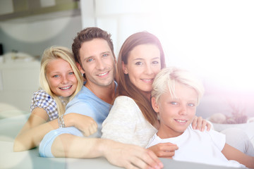 Portrait of family relaxing in sofa