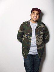 Fototapeta premium Casual young guy posing against white background