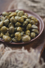 Marinated capers, shallow depth of field, studio shot