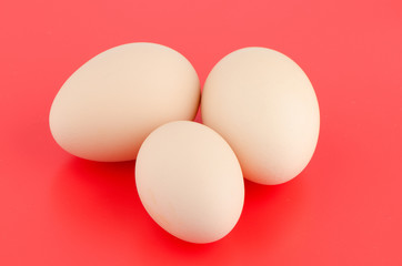 Three brown eggs