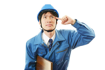 頭痛を訴える作業員