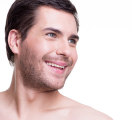 Obraz premium Portrait of handsome smiling young man.