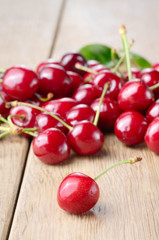 Organic Cherries on the wooden table