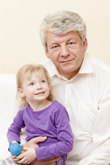 portrait of grandfather with his granddaughter