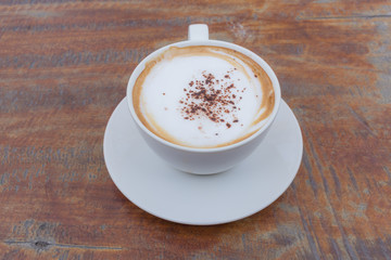 Hot Coffee cup on Wooden Table