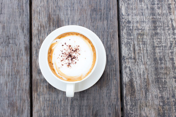 Hot Coffee cup on Wooden Table