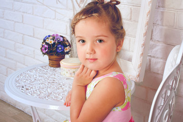 Cute little girl  with spring flowers