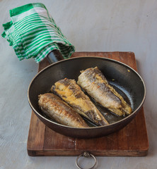 Fried fish in a frying pan